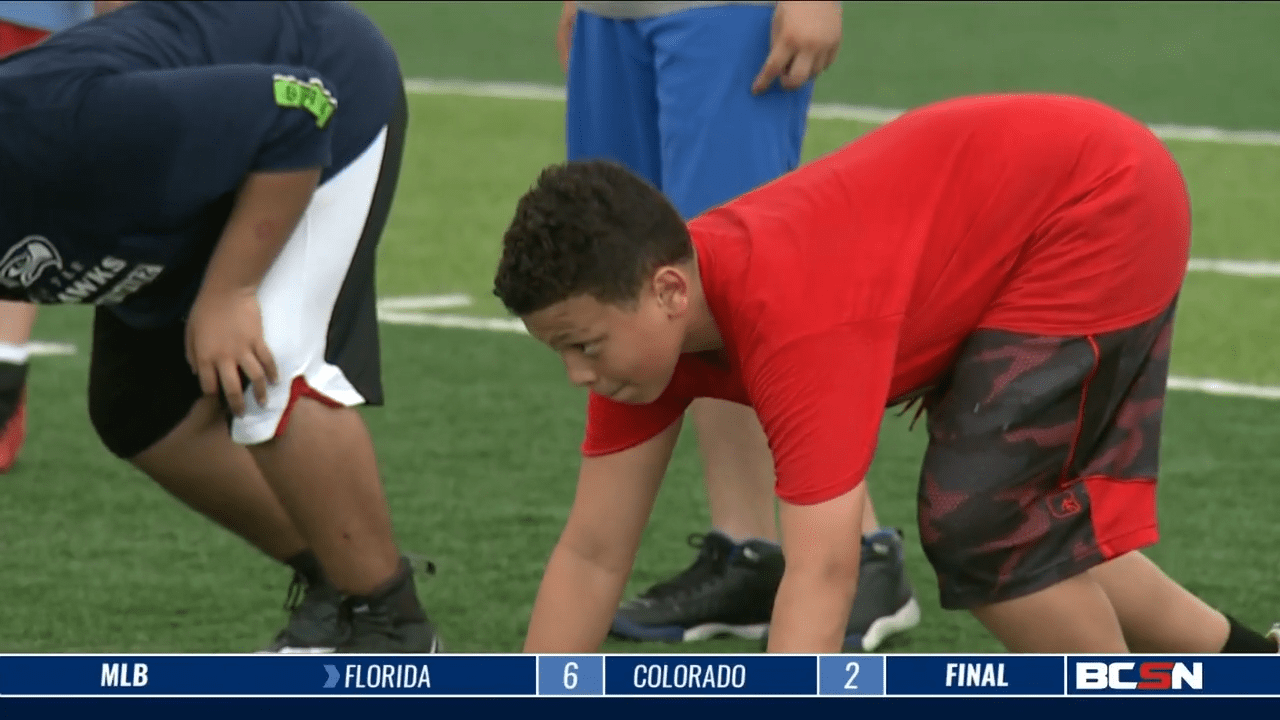 Jeremy Lincoln Hosts His Pro Football Camp at Woodward HS