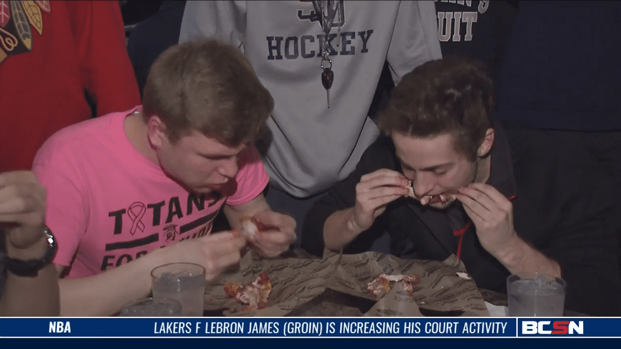 St. John’s Athletes Clash in Wing Eating Competition