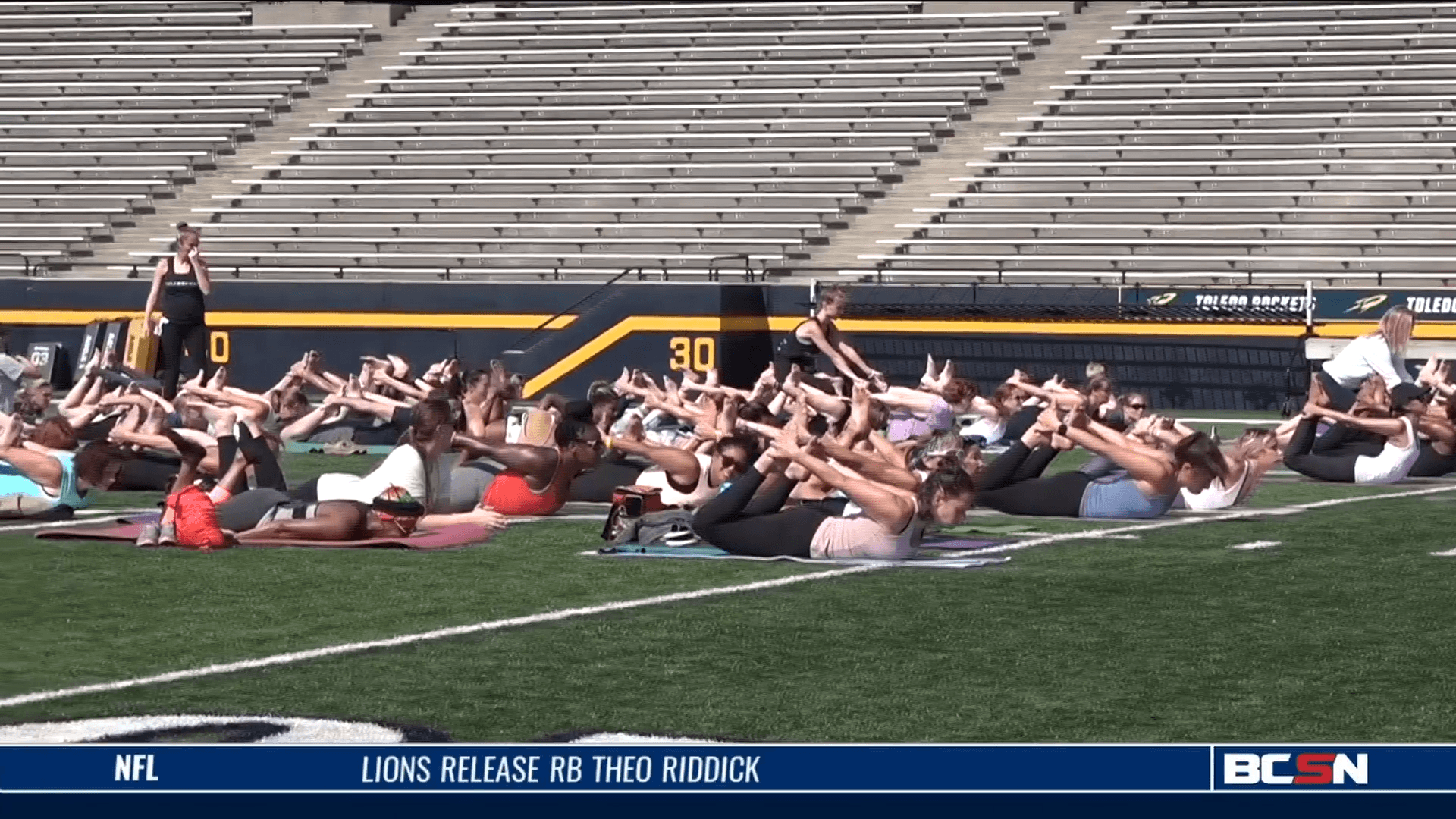 UT Football Hosts One Rocket One Yoga