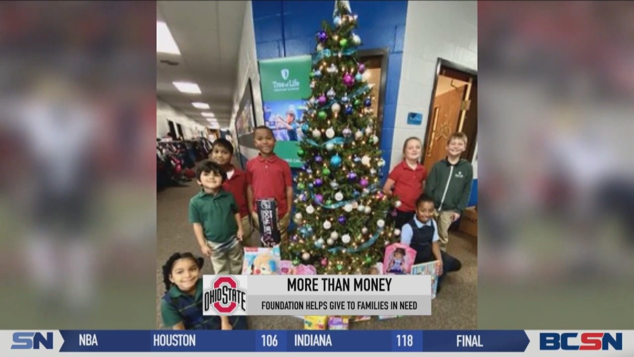 OSU's Johnson Gives Back to Families in Need