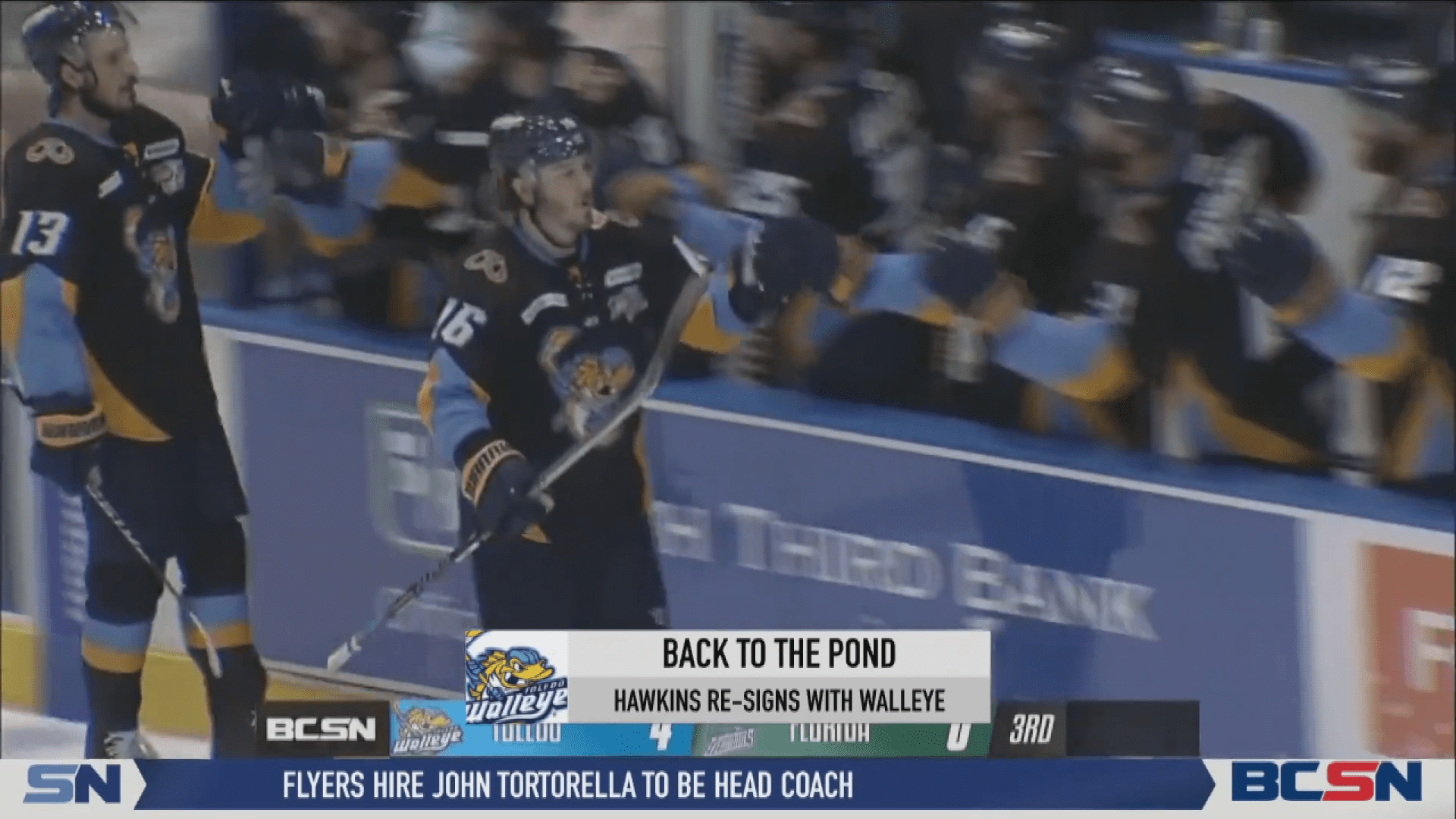 Walleye Celebrate Signing Hawkins and Denis