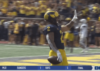 Corum Ties Record with 5 TDs, Michigan Steamrolls UConn
