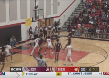 Scott Rallies to Sink Rogers on the Road