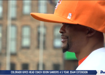 Eddie George Delivers First Ball At Mud Hens Opening Day