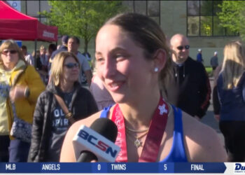 Support Staff and Volunteers Line the Streets for the Glass City Marathon
