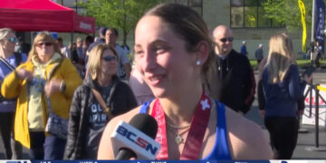 Support Staff and Volunteers Line the Streets for the Glass City Marathon