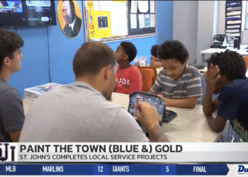 St. John’s Football Lends A Helping Hand To Community