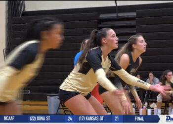 Katie Pahl Slamming Spikes for the Yellow Jackets