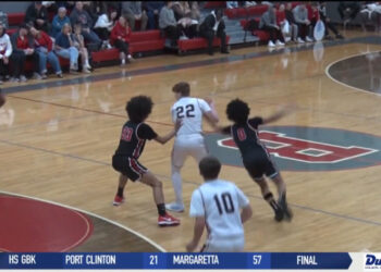 Rogers Steals Road Win at Bedford, 64-56