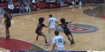 Rogers Steals Road Win at Bedford, 64-56