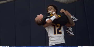 Toledo Rockets Team Up with Local Kids for Victory Day